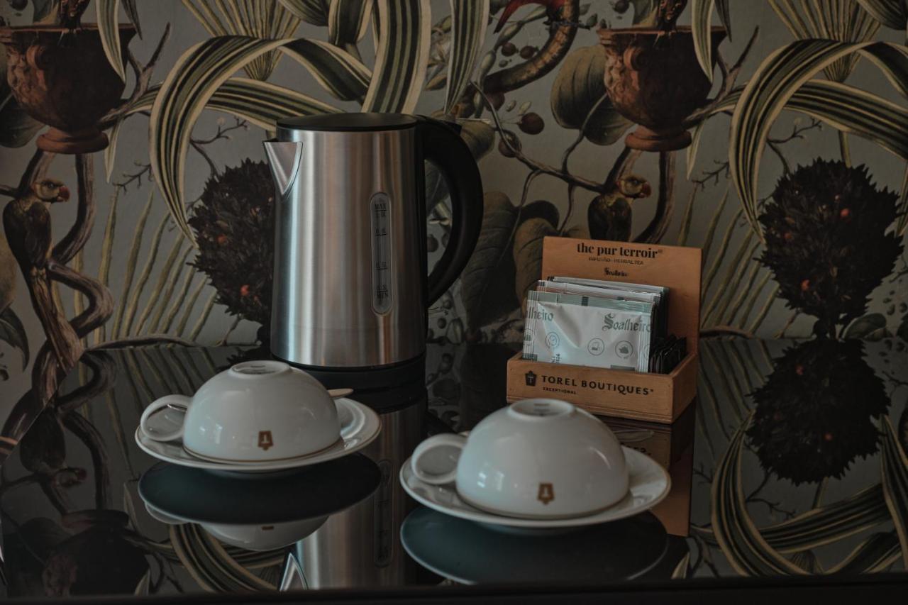 Torel Palace Лиссабон Экстерьер фото A tea kettle